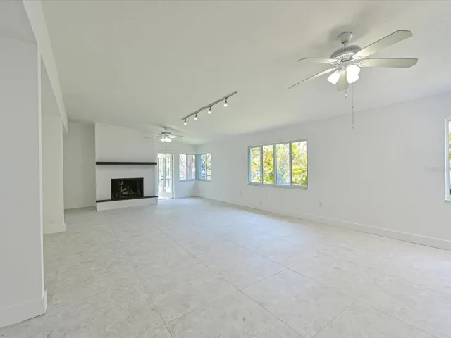 Family room with wood burning fireplace