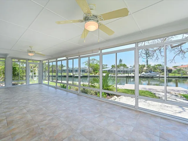 Enclosed lanai with canal view