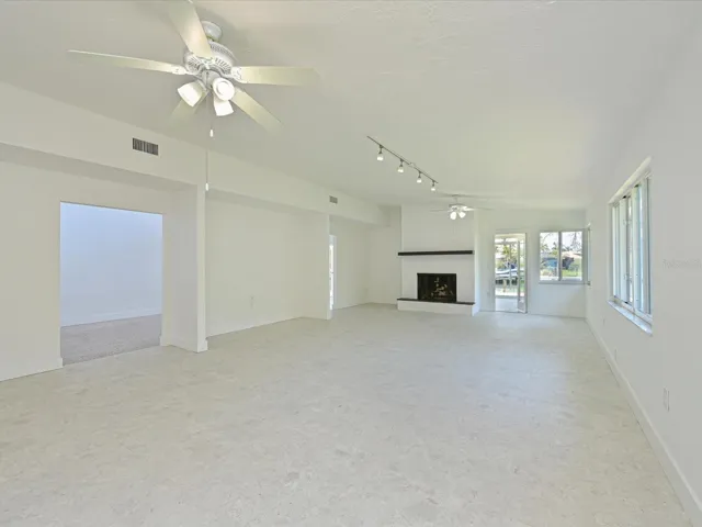 Family room with wood burning fireplace