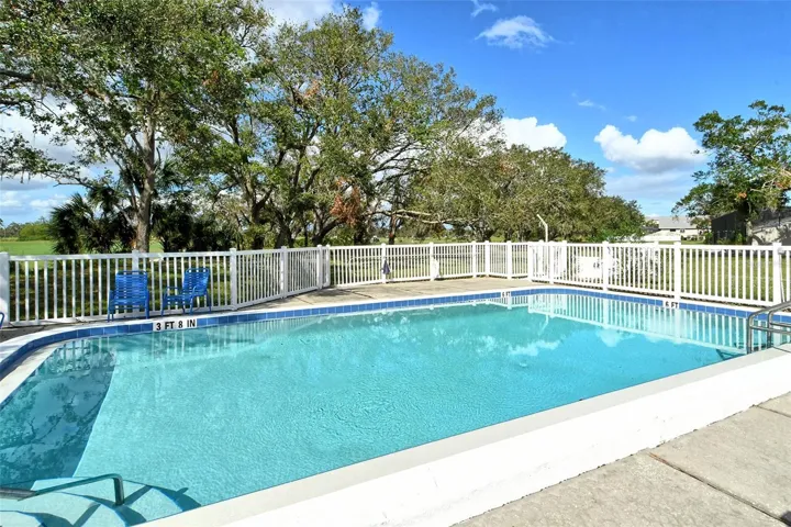 The Hideaway offers a great lifestyle with lush landscaping, mature oak trees, two community pools, and scenic walking trails