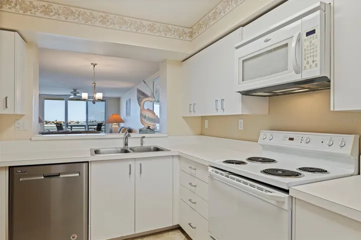 Spacious kitchen with pass through to dining area
