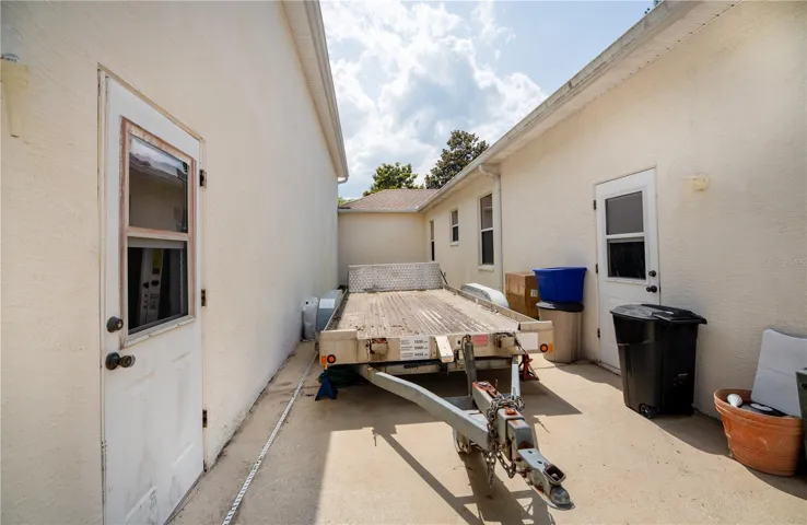 Open Storage between garage & camper