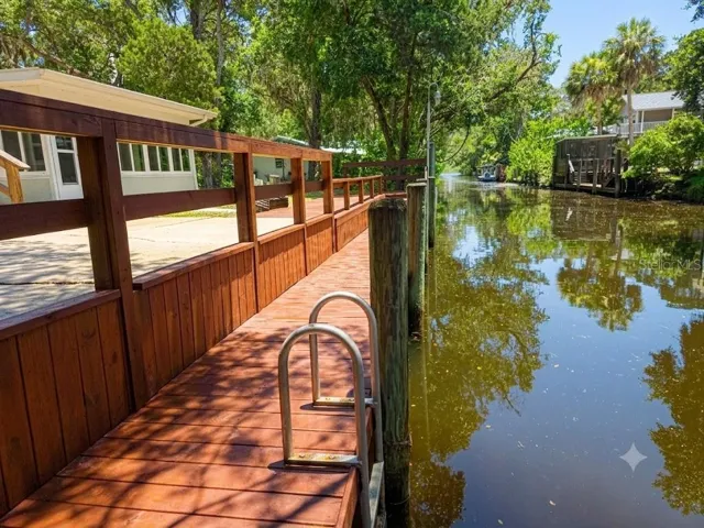 Dock runs full width of property
