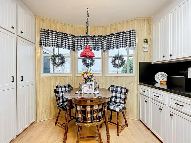 Dinette with a lot of cabinets