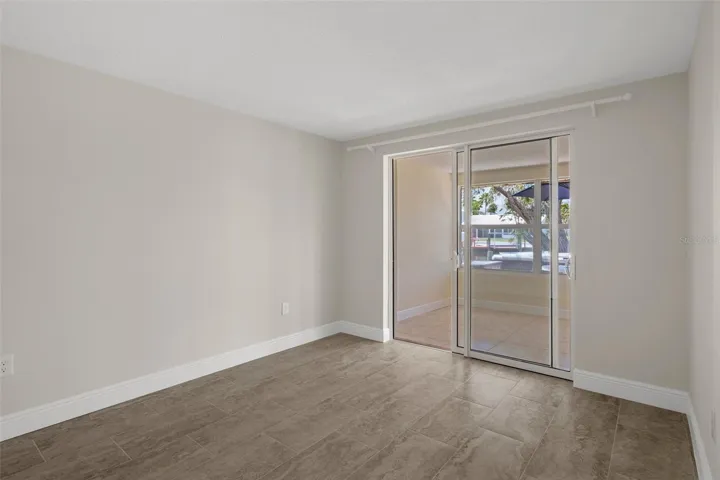 Guest Room has water view. sliding door out to Florida Room.