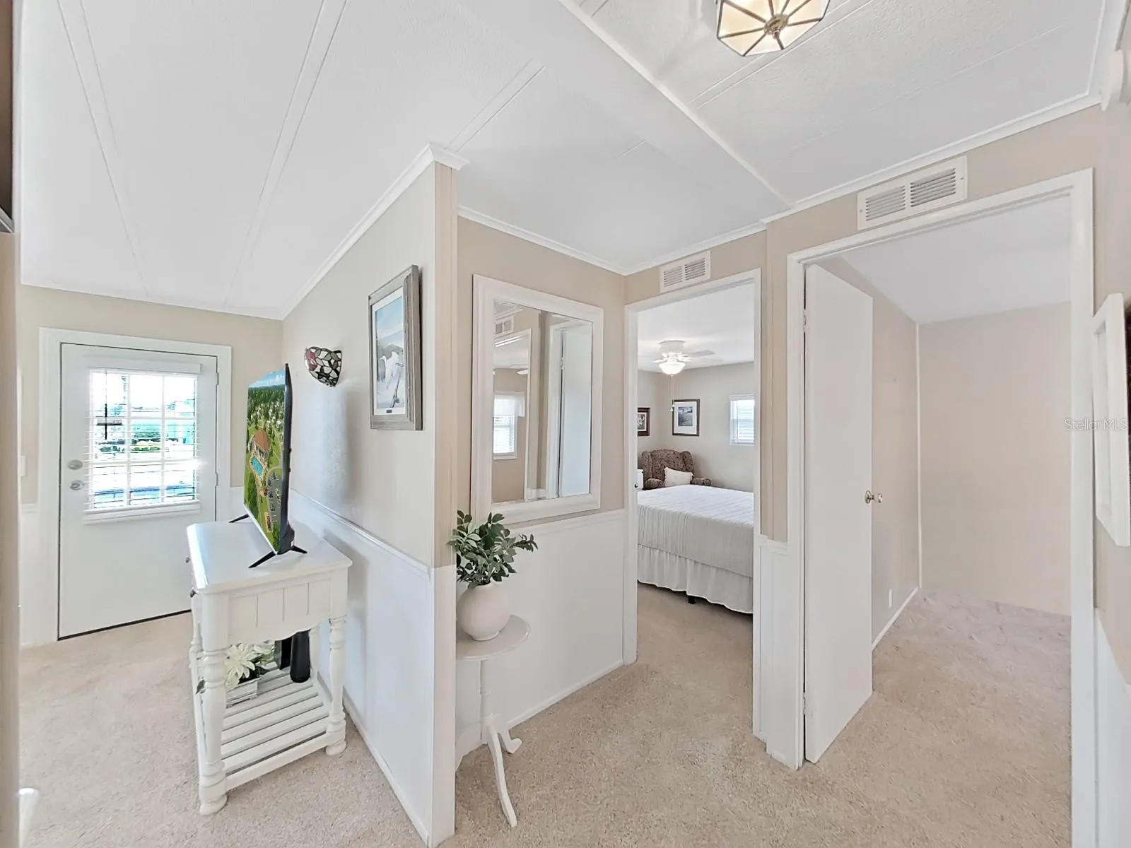 Entrance to both bedrooms near the guest bathroom