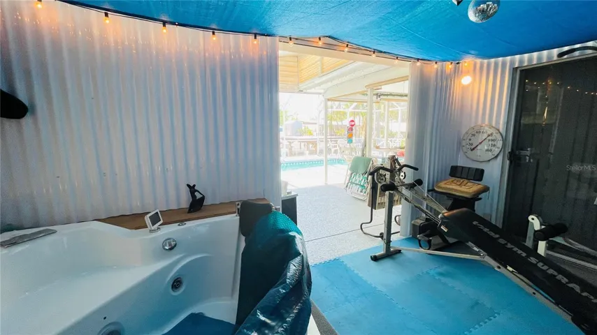 Spa and pool outside primary bedroom