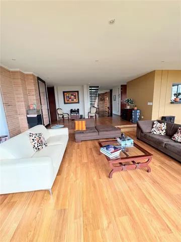 Living room opens to entry way