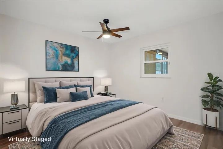 Primary Bed: Comfortable primary suite with clean, neutral finishes. (virtual staged)
