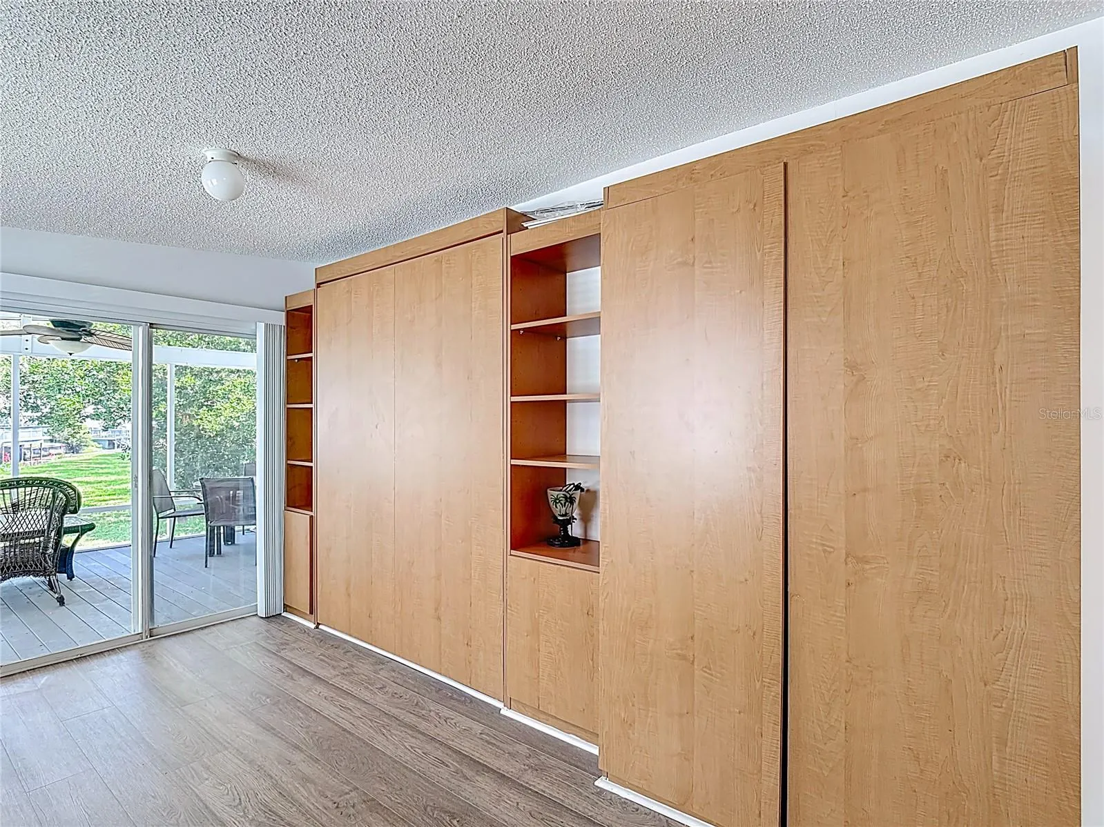 Murphy bed offers additional sleeping space which is tucked away when not in use