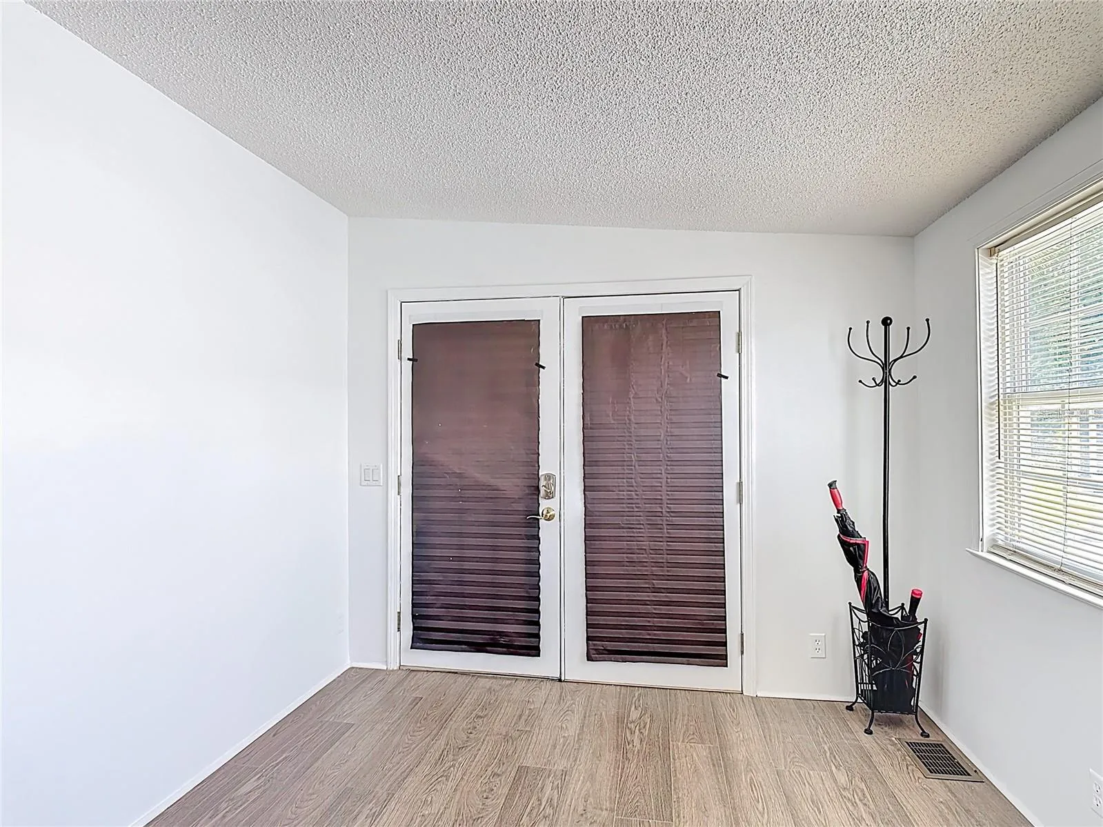 French doors leading from the front of the home