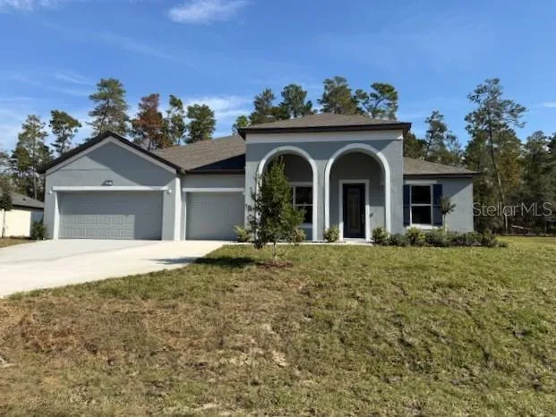 Stunning Exterior- Block construction, 3 car garage,