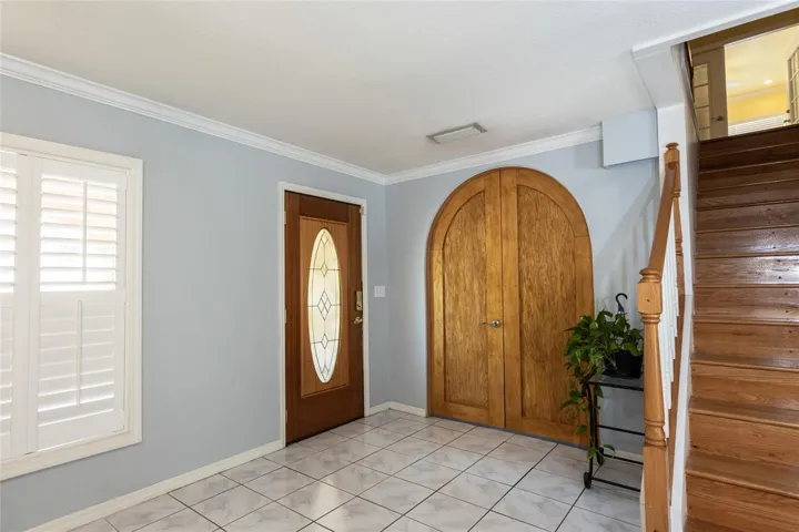 Chapel doors leading to Living room that can be converted into a bedroom.