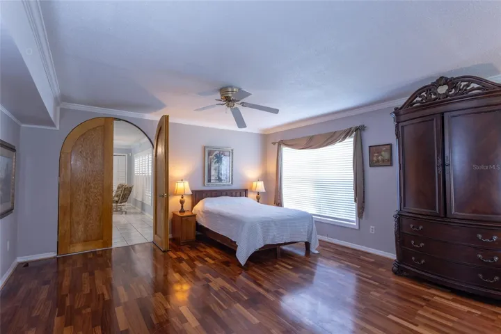 Living room being used as a bedroom.