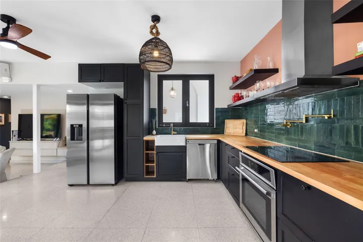 Remodeled Kitchen with induction Cooktop and Farmhouse Apron Kitchen White Kitchen Sink