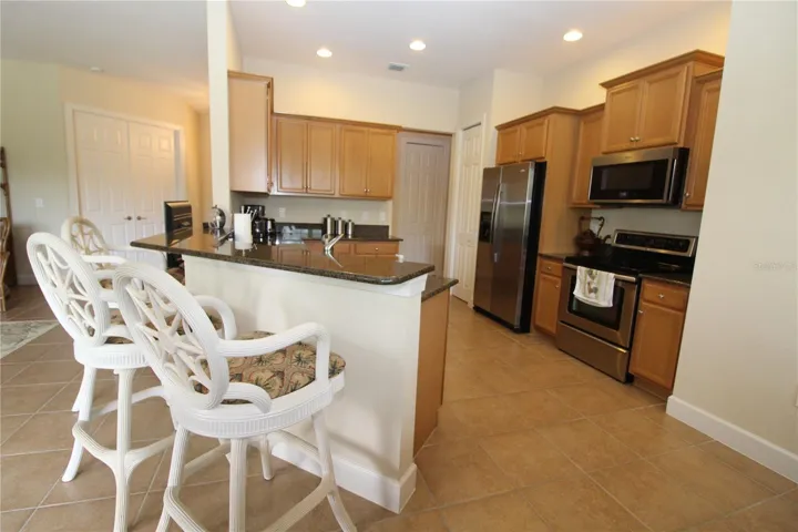 Spacious Kitchen ....granite countertops....stainless steel appliances and more...