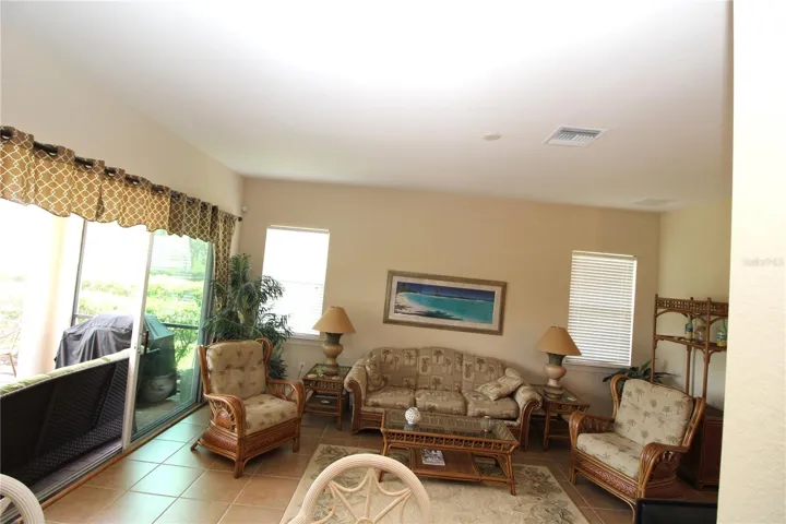 From Kitchen looking into the living room and out back to the lanai....