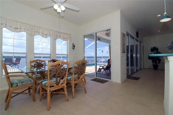 Dining area has slider entry to lanai