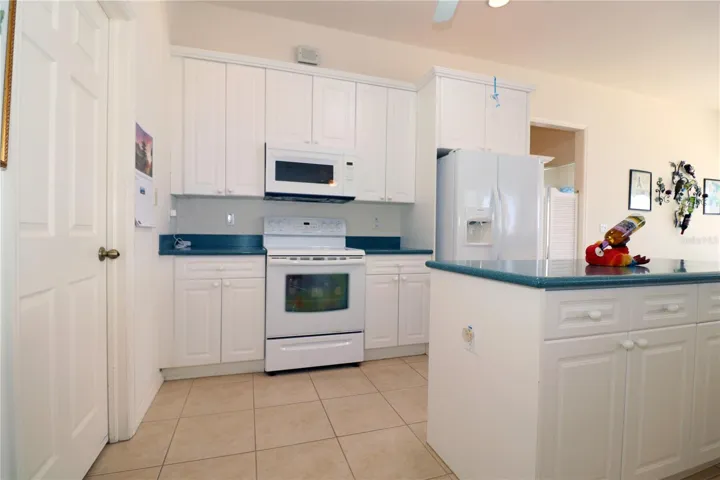 Kitchen has closet pantry