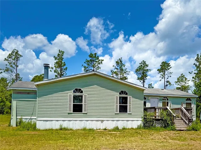 Front of home, facing East