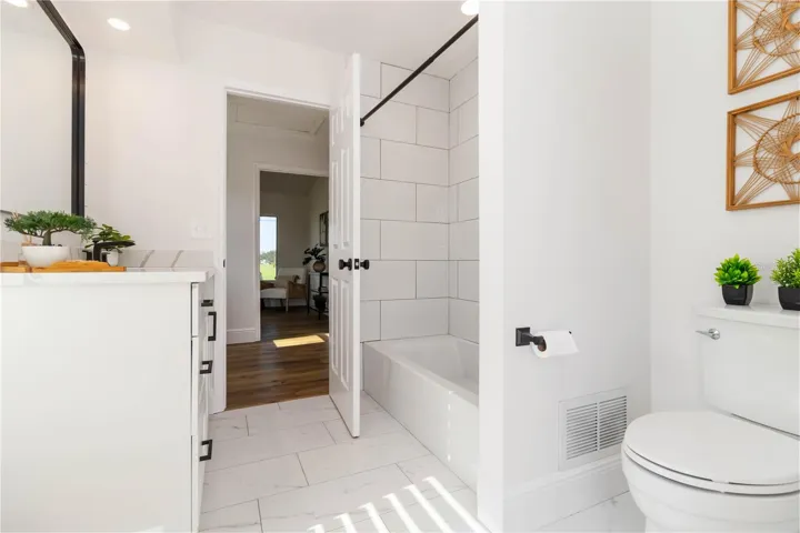 Bathroom 2 with tub/shower combination.