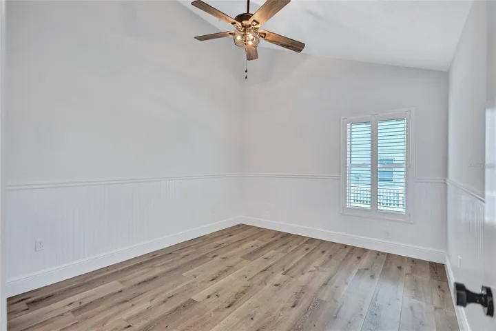 Bedroom 3 has a higher sloped ceiling.