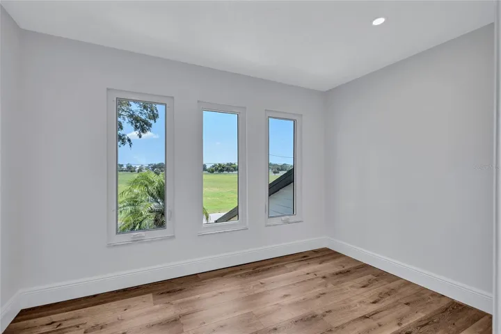 This large, bright walk-in closet is located off the primary ensuite bath.