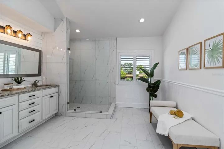 Primary ensuite bathroom with private water closet.