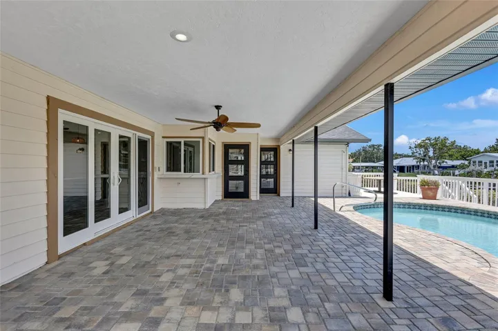 Two pass-through windows with counters make it easy to entertain outdoors.