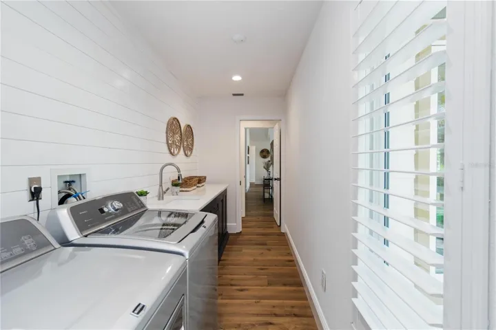 Laundry room has a great counter for folding.