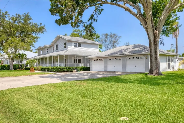 Large three car garage on oversized corner lot
