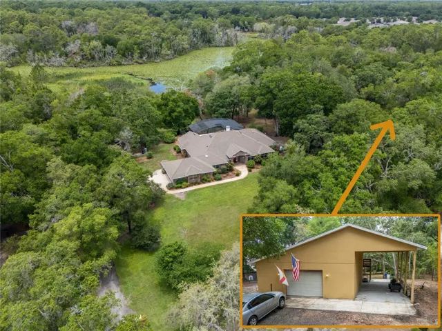 Welcome to this beautiful pool home sitting on a 2.6 acre lot with a pond to the rear full of lily pads! With the garage/ RV shed.