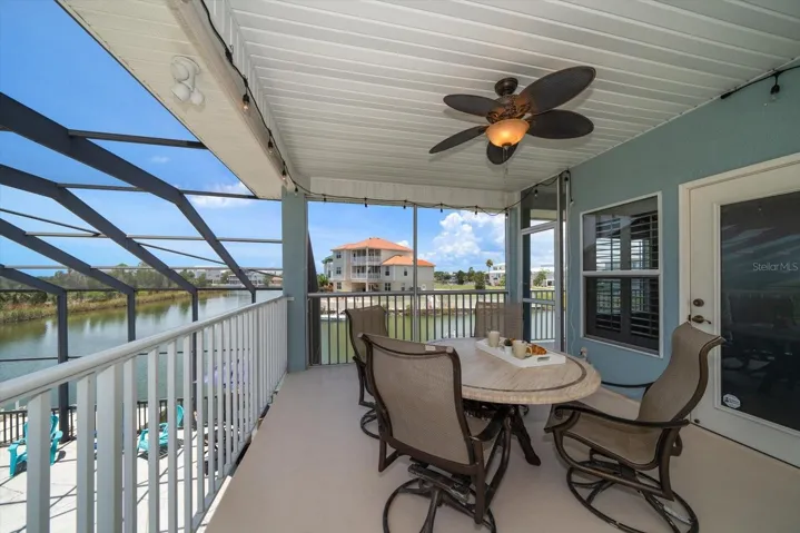 The breakfast patio or the perfect spot to monitor the pool while staying out of the splash zone:)