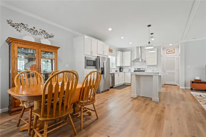 Front door view of dining room/ kitchen