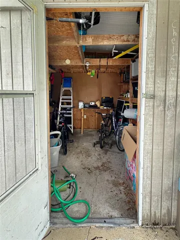 Storage unit at the end of the carport