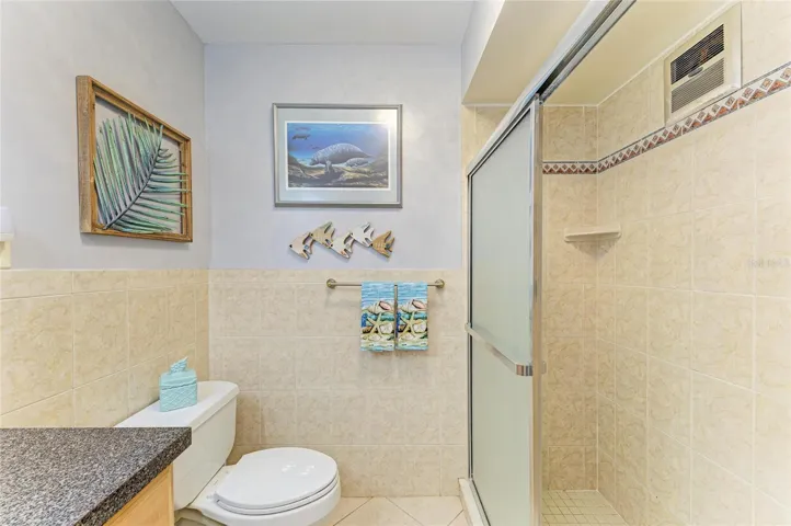 Bathroom with tiled shower