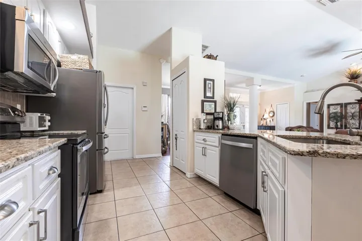 Beautifully maintained kitchen with quality finishes and open flow to living areas.