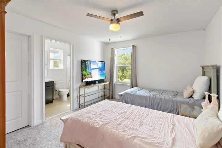 Upstairs bedroom with a private bathroom