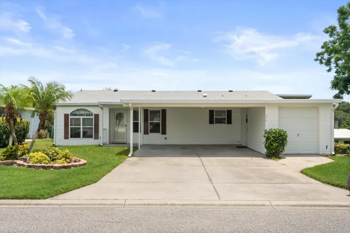 NO STEPS into Main Entry or Garage....Desirable Flatter Wide Double Driveway and Golf Garage