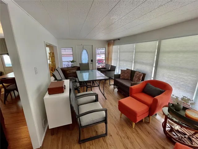 Front Florida room, this room does have AC and windows… som furniture belongs on patio