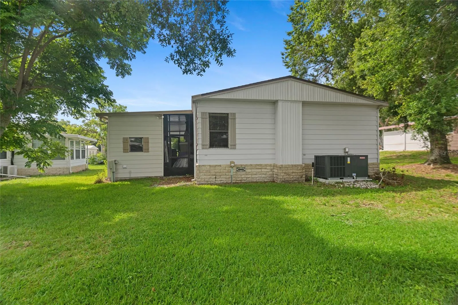 Rear of home, laundry room, new AC!