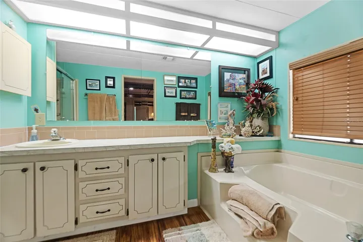 Primary bathroom with garden tub and separate shower