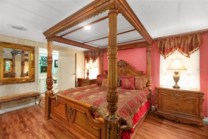 Large primary bedroom accommodates king-size furniture