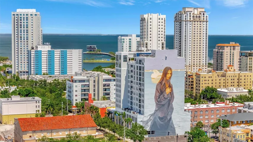 Artist, Emmanuel Jarus's mural on the Walker Whitney Building