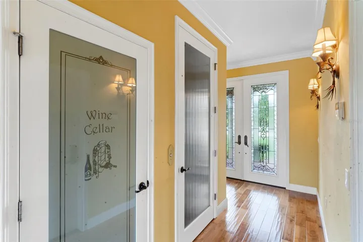 Downstairs, second door to the right is the elevator and door to wine cellar