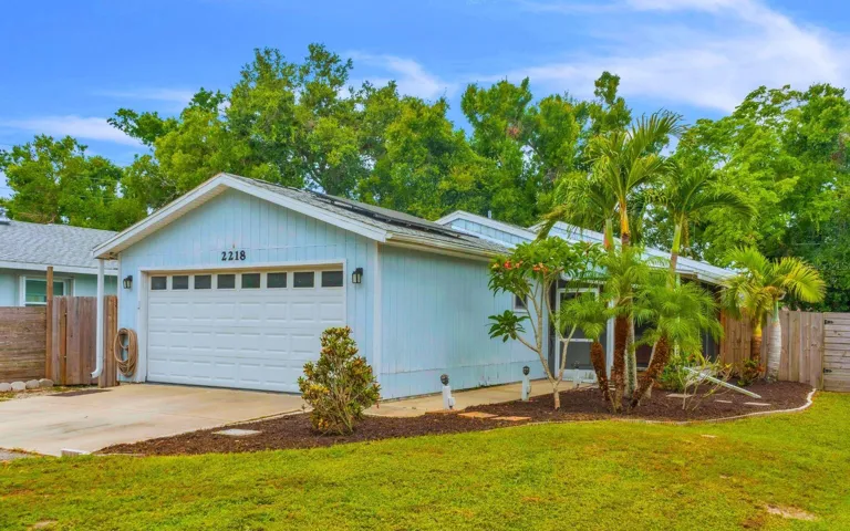 Front of Home nestled in privacy, yet close to all of Venice and US 41