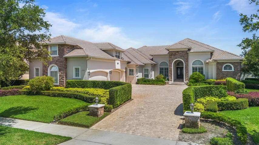 Experience refined luxury living in this meticulously maintained custom estate in Keene’s Pointe.