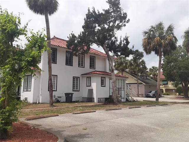 Back of building. Parking on North side also