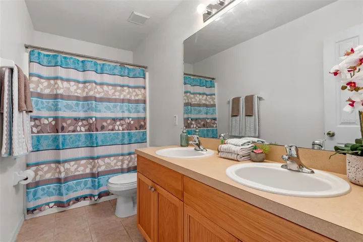 Upstairs Full Bath with tub/shower and Dual Sinks