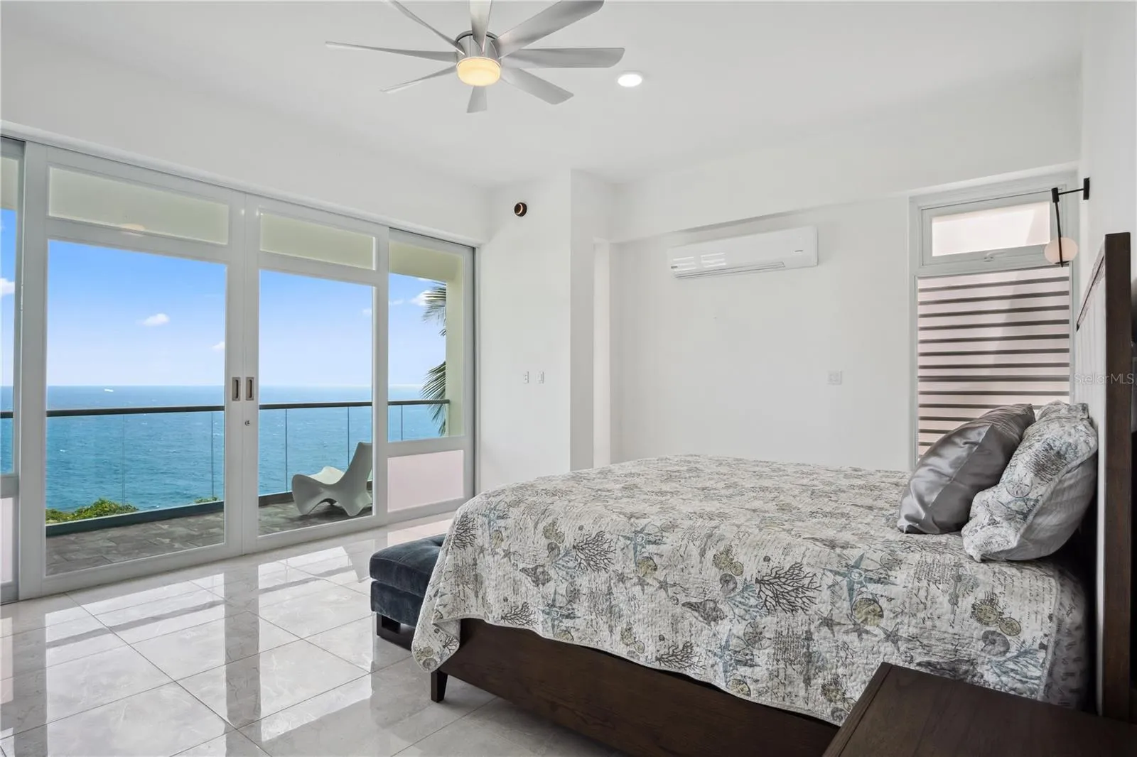 Master bedroom with private balcony.